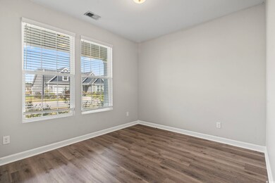 Spare room featuring a healthy amount of sunlight 