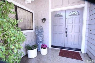 Front Entry with remodeled leaded glass doors.