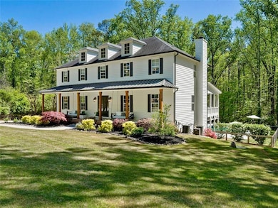 View of front of house featuring covered porch, a 