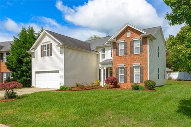Lovely large level lawn with partially fenced backyard