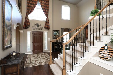 Beautiful entryway features hardwood floors and plenty of gorgeous sunlight!
