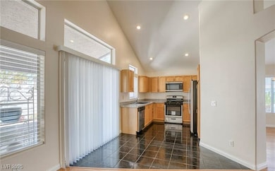 Kitchen featuring appliances with stainless steel