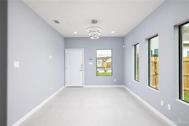 Spare room with a chandelier