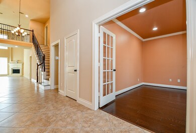 Bright and spacious entryway with tiled floors, fe