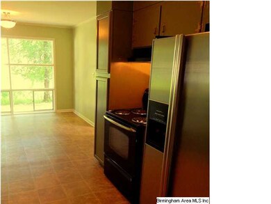 The eat in area of the kitchen, overlooking the ba