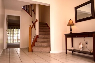 Beautiful tile entry and curved staircase