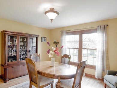 Formal dining room with large front window that pr