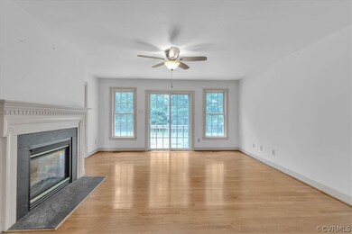 Unfurnished living room with a premium fireplace,