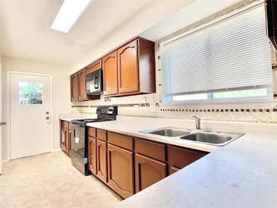 7841 Green Lawn Dr unit 7841, Houston, TX 77088 - photo 3