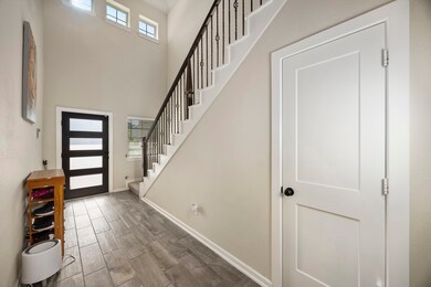 Plenty of natural lighting. Powder room just off t