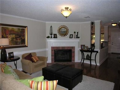 Living room has new hardwood floors and hand-laid 