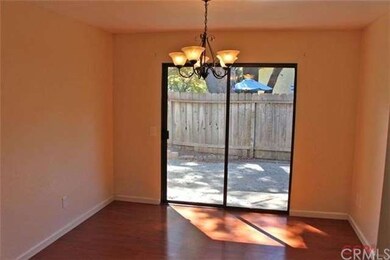 THE DINING ROOM SLIDER LEADS OUT TO THE PATIO