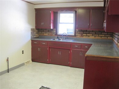 Kitchen with lots of cabinets.