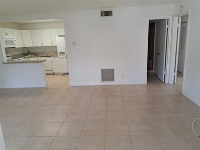 5960 Whispering Pine Way unit D-1, Greenacres, FL 33463 - photo 3
