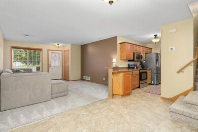 Bright and open main floor with new flooring throughout.