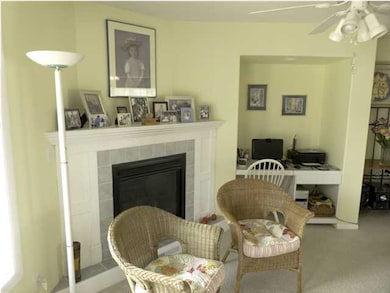 Hearth room with a gas fireplace and a built in de