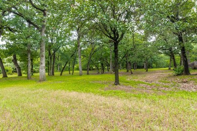 2 Beautiful acres with tons of trees
