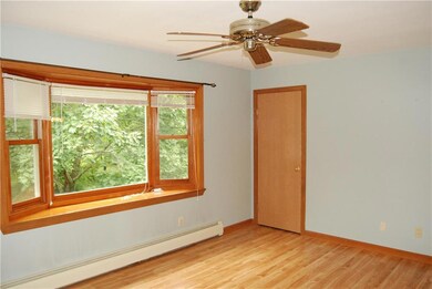 Living room offers large coat closet