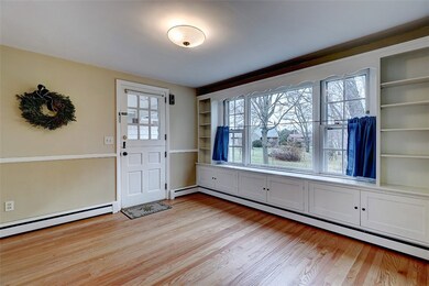 Dining room, hardwood floors, Dutch door, wainscot