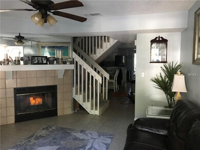 Living Room with Wood Burning Fireplace