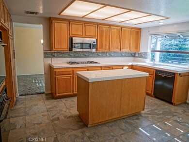 Open kitchen with eat-in breakfast nook, just off the family room