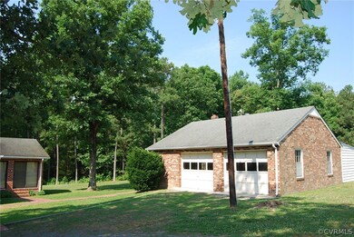 Detached brick and block 32X28 garage with a walk