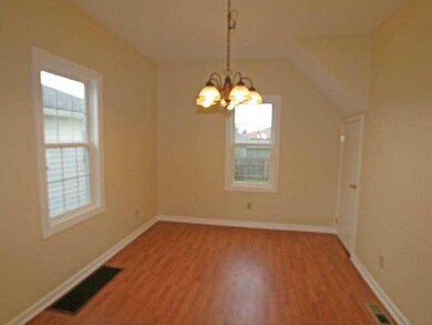 Dining Room. The dining room has neutral decor and