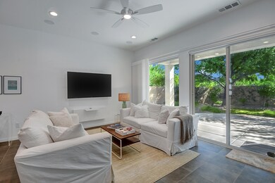 LIVING ROOM ANGLED TO BACK YARD MLS
