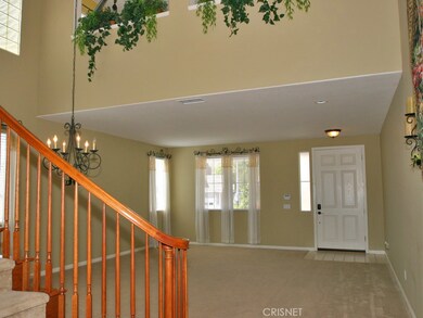 Light and bright formal Living room and Dining room.