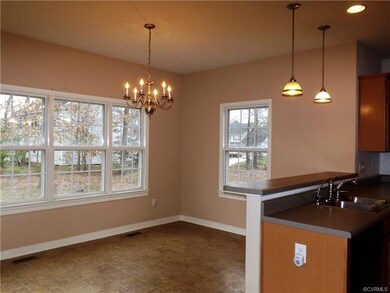 The Light and Bright Breakfast Room is 13'2