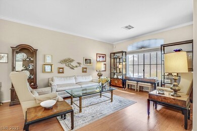 Formal living room with wood laminate flooring