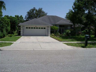 Two car garage with lots of additional parking.