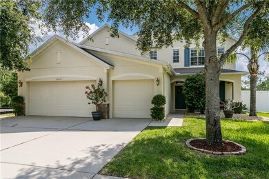 3 car garage & spacious driveway & a front porch!