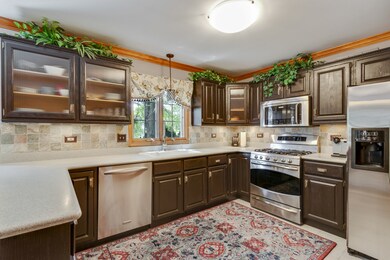 Fully equipped kitchen features stainless steel ap
