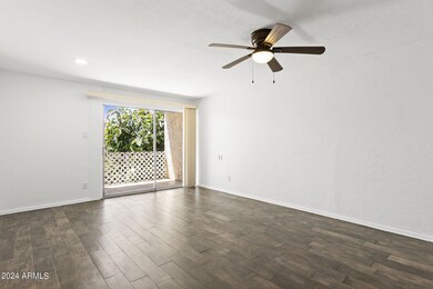 Living space opens to private balcony