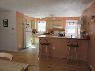 Door off kitchen leads to back deck