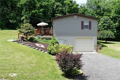 EXTERIOR SIDE/1 CAR INTEGRAL GARAGE/ENTRANCE TO FI