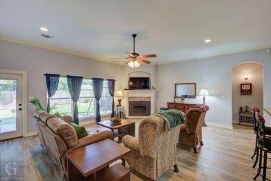 Dinning  room with crown molding, wood-type floori