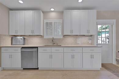 Brand-new cabinets, plantation shutters, inset lig