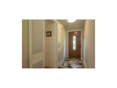 Front entry with coat closet - and a pretty door!