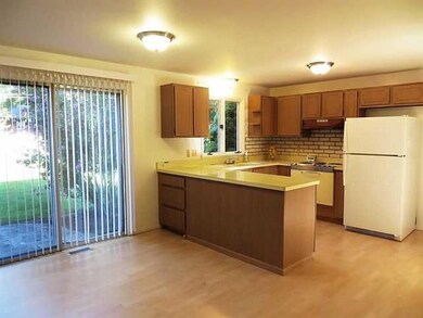 Exterior Front Cheery kitchen opens to the Family 