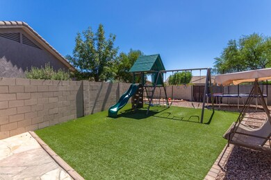 Huge side yard with artificial turf