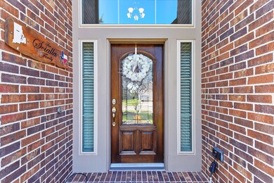 Front Door is a beautiful mahogany with lead glass.