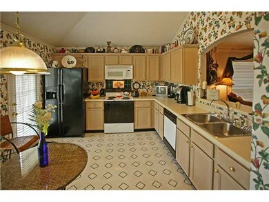Large open kitchen has so many cobinets.
