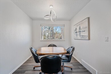 Great dining area that overlooks the backyard and 