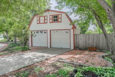 Detached Garage/Workshop has potential for a Garage Apartment or Home Business.