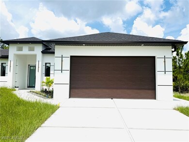 Entrance to property featuring stucco siding and f