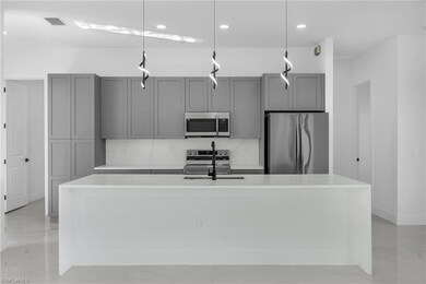 3409 24th St SW, Lehigh Acres, FL 33976 - photo 3