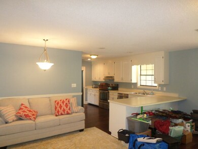Keeping Room Off Of Kitchen With Breakfast Area an