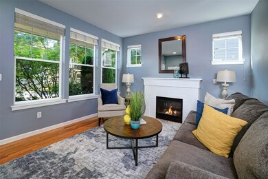 Beautiful windows let the sun inside all day long. Lovely oak hardwoods on main level as well as upper floor.